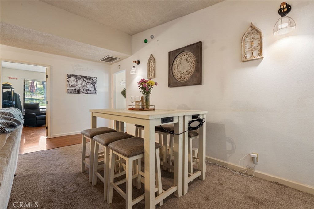9068 Montero Road Valley Springs, CA 95252 - Photo 9 of 50 a view of a dining room with furniture