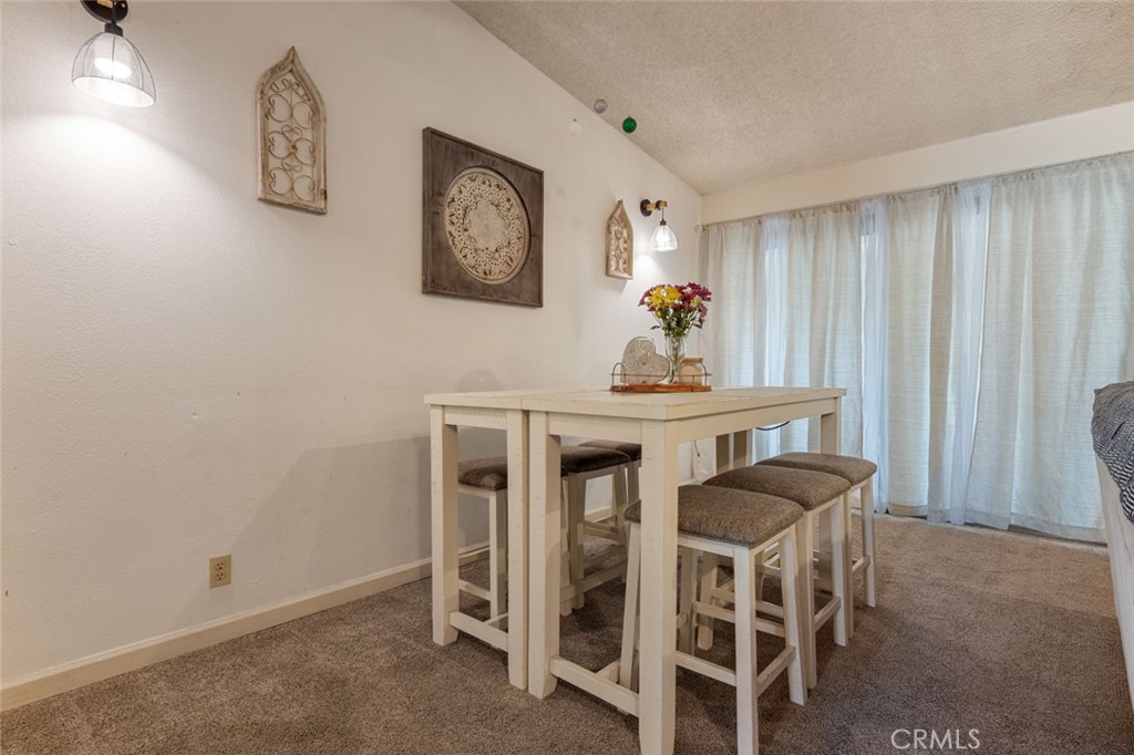 9068 Montero Road Valley Springs, CA 95252 - Photo 10 of 50 a dining room with furniture and window