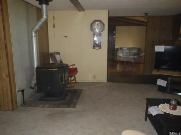 a view of a livingroom with furniture and wooden floor