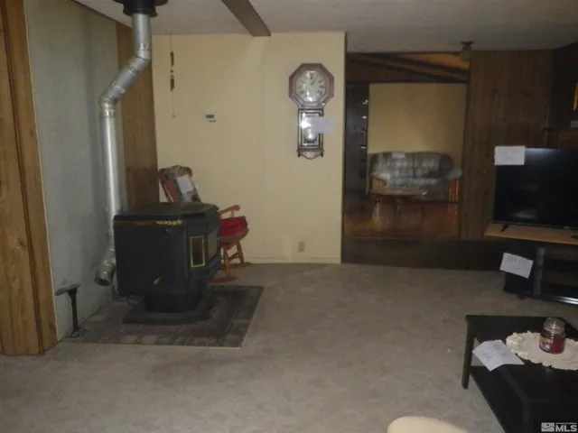 a view of a livingroom with furniture and wooden floor