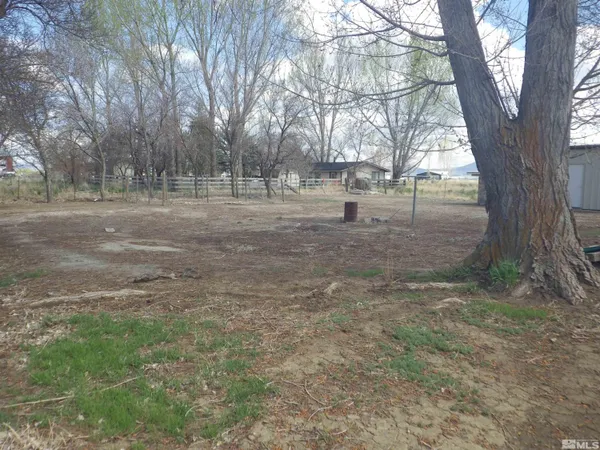 a view of an empty room with windows
