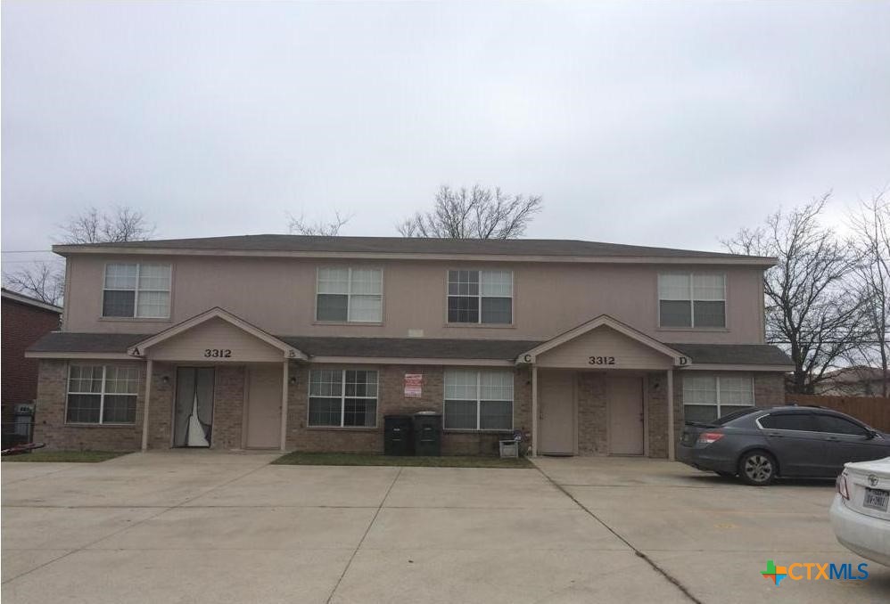 3312 Cantabrian Drive, Unit C Killeen, TX 76542 - Photo 1 of 21 a front view of a house with parking space