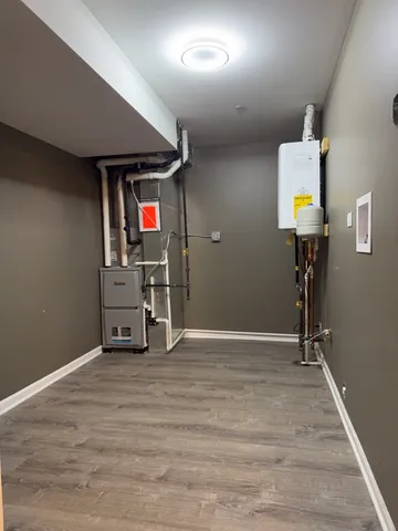 a view of a livingroom with wooden floor