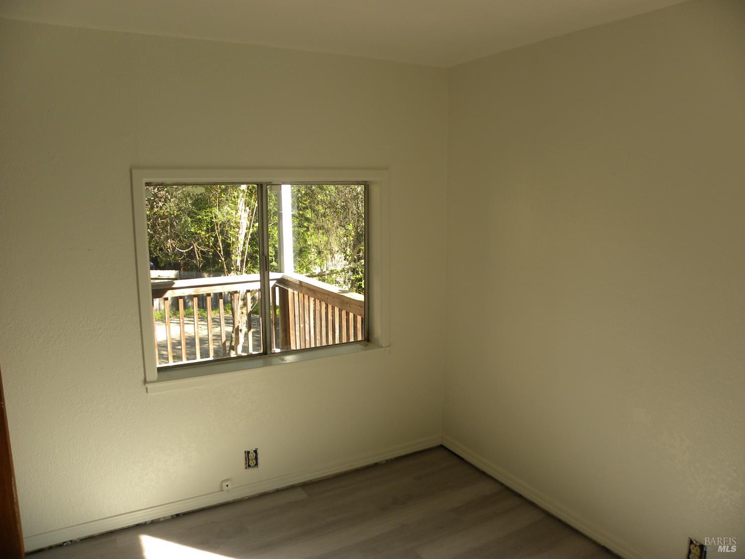 8260 Trenton Road Forestville, CA 95436 - Photo 14 of 24 a view of an empty room with a window