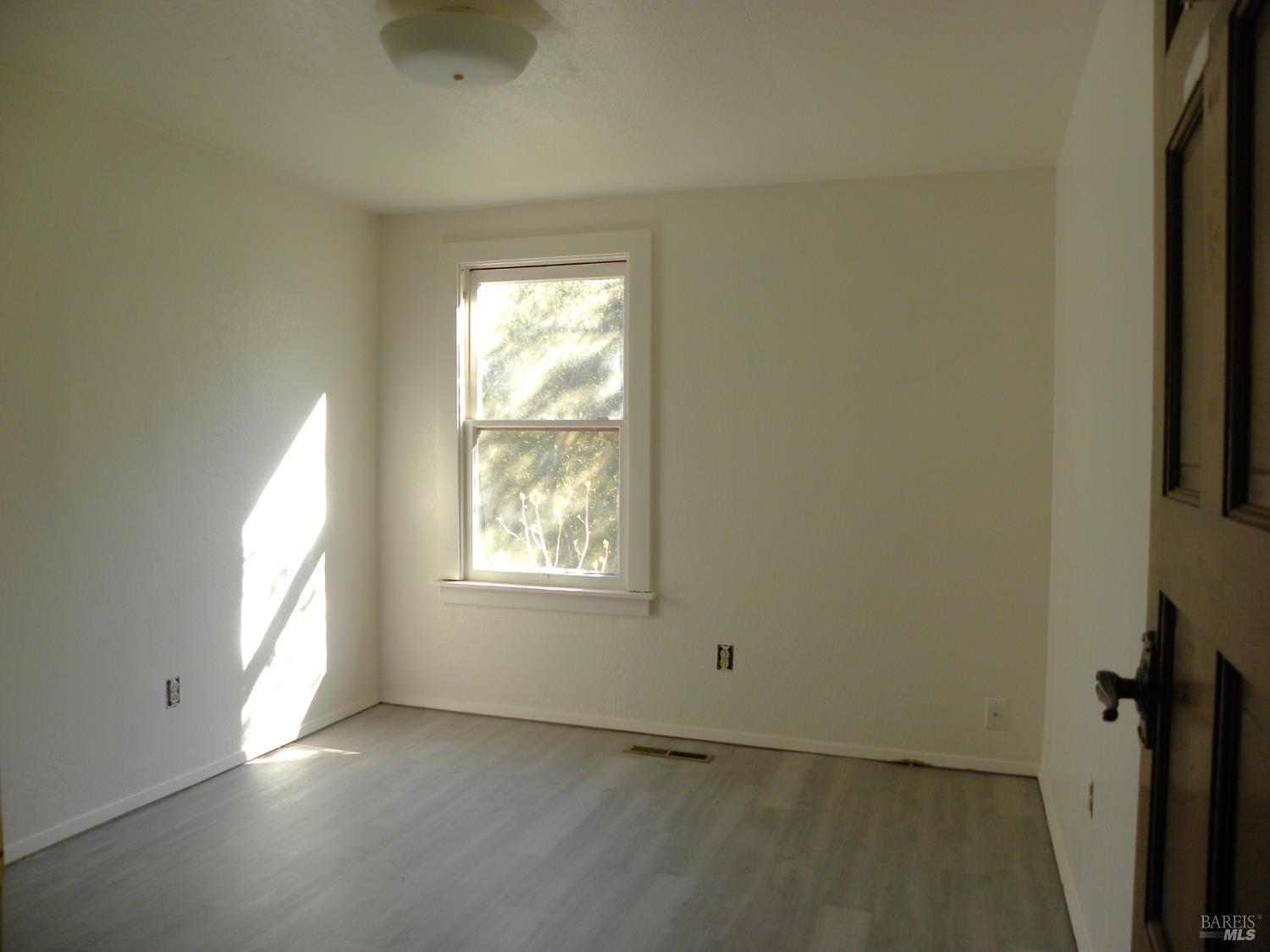 8260 Trenton Road Forestville, CA 95436 - Photo 15 of 24 an empty room with windows