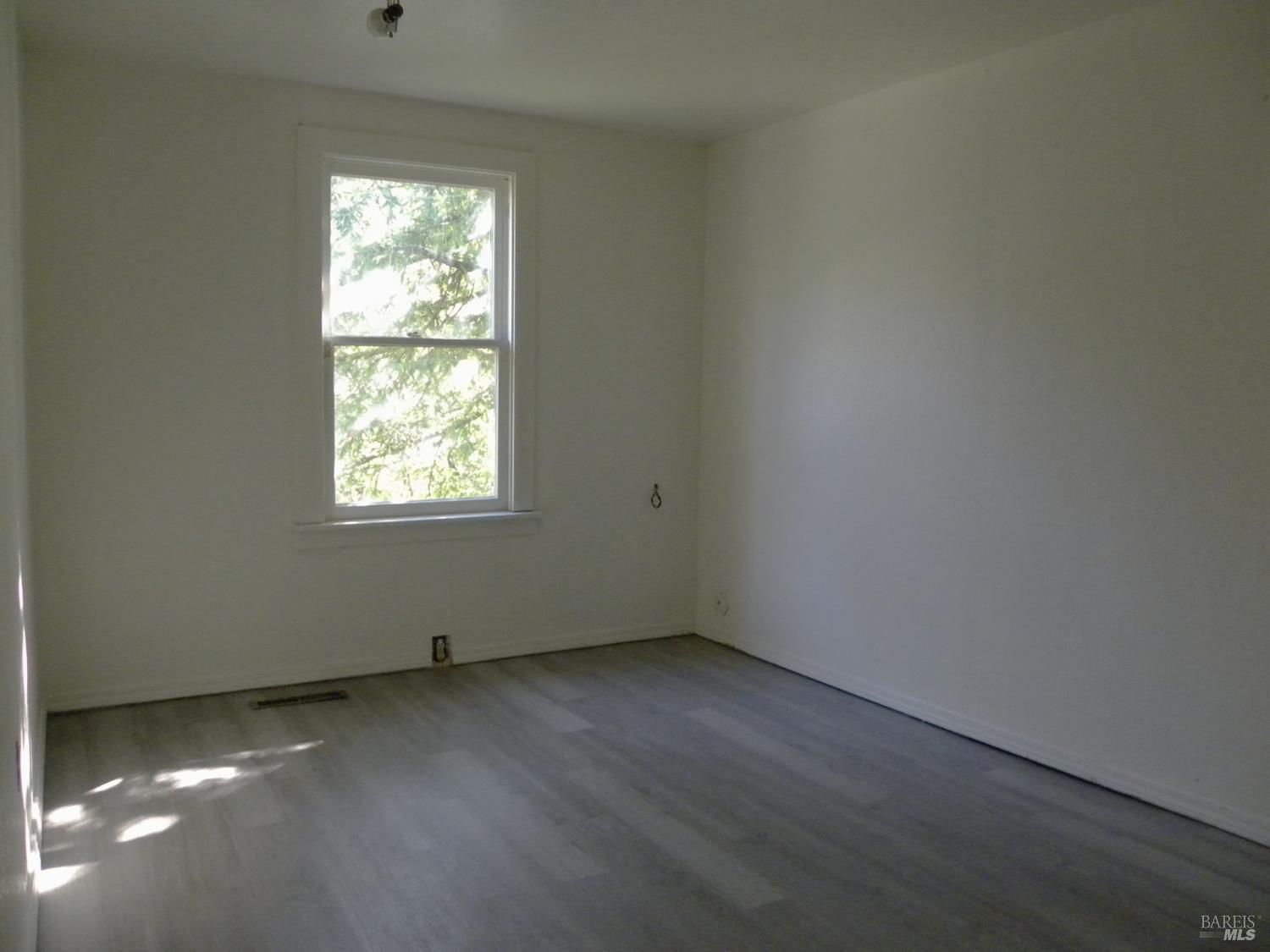 8260 Trenton Road Forestville, CA 95436 - Photo 18 of 24 an empty room with a window