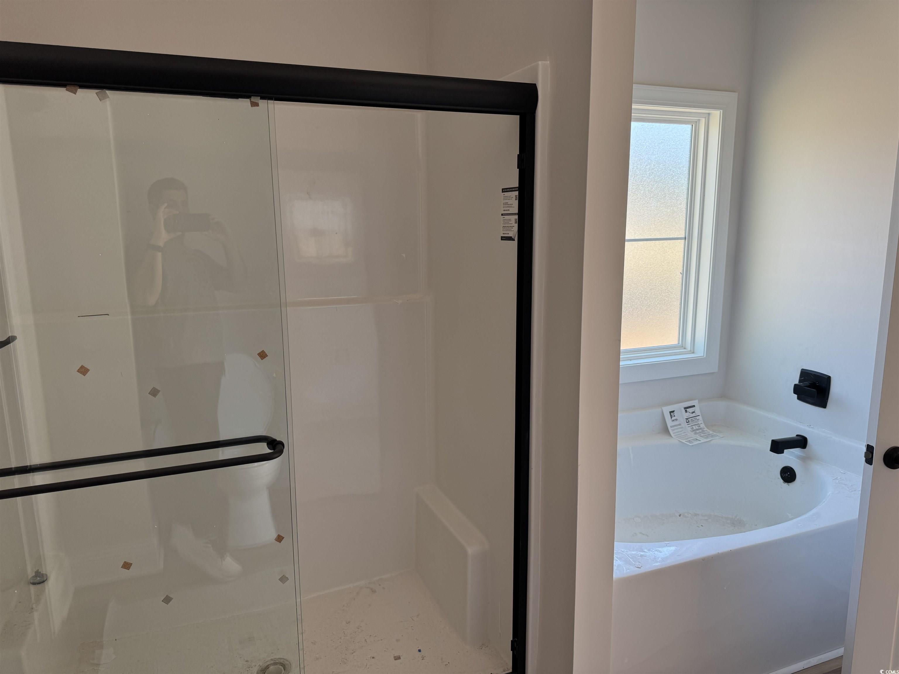 1351 White Oak Lane Galivants Ferry, SC 29544 - Photo 10 of 12 Bathroom featuring a shower stall and a bath