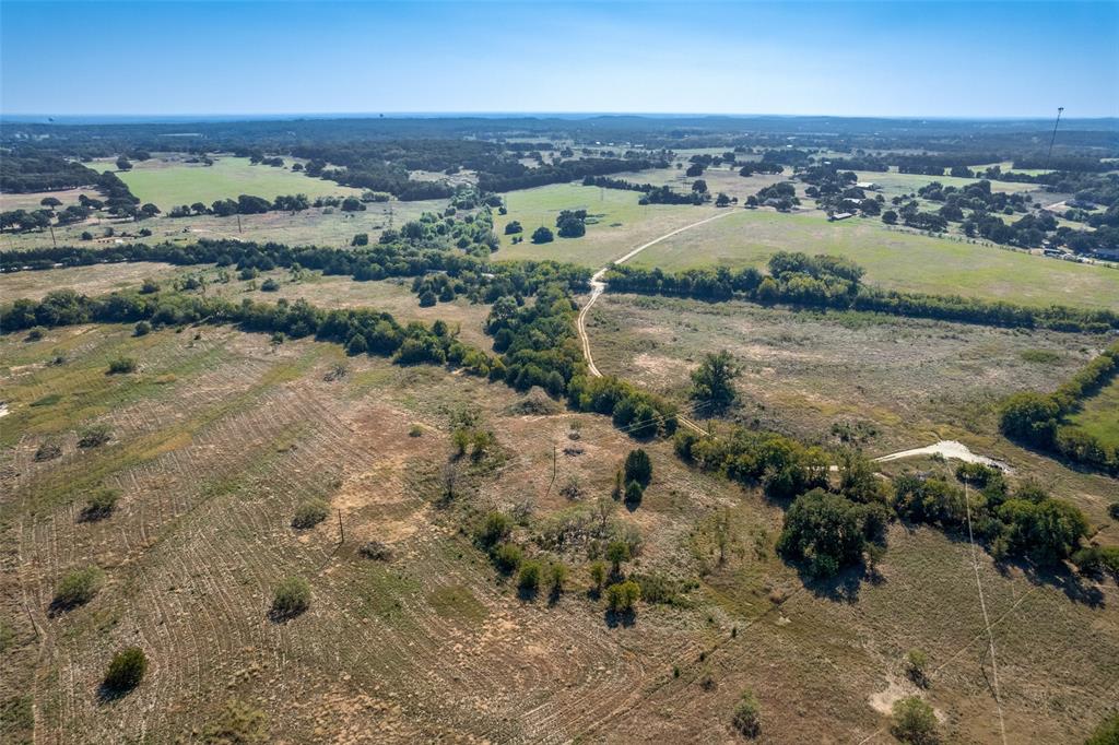 1879 C R 151 Gainesville, TX 76240 - Photo 3 of 8 an aerial view of a houses with a yard