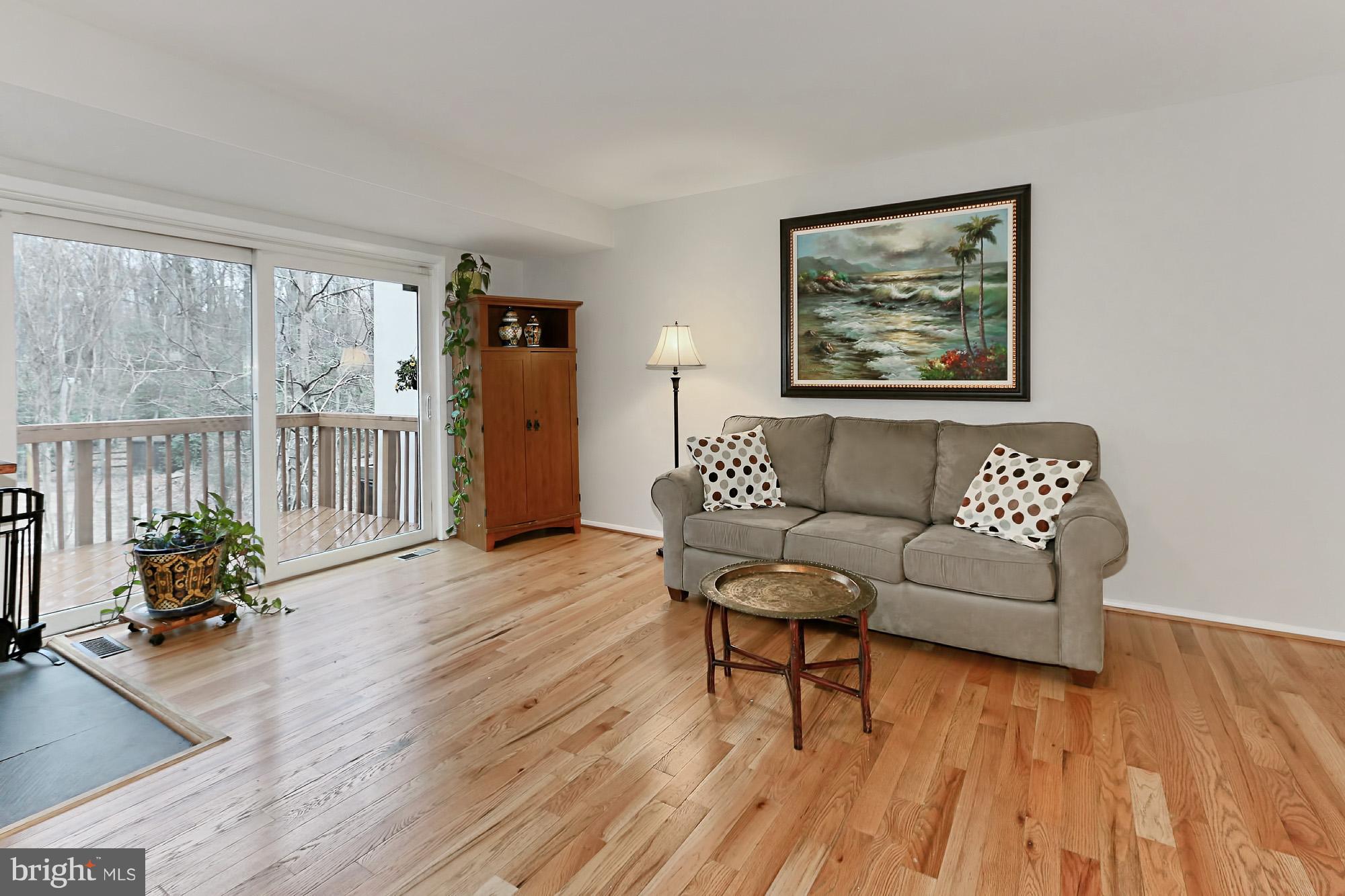 2380 Generation Drive Reston, VA 20191 - Photo 11 of 30 a living room with furniture and a wooden floor