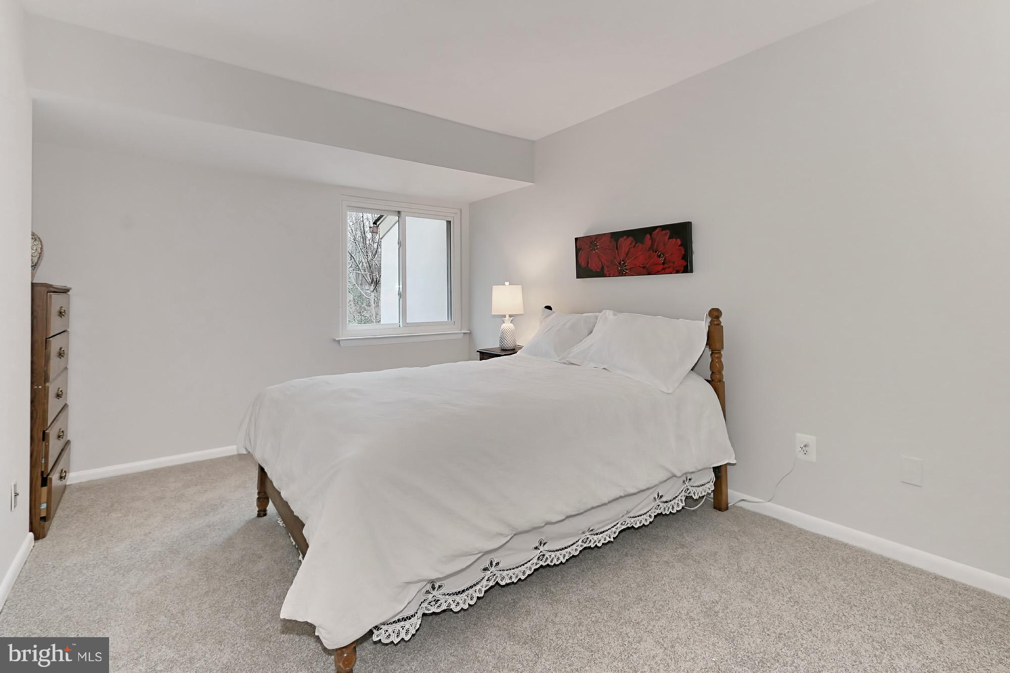 2380 Generation Drive Reston, VA 20191 - Photo 18 of 30 a bedroom with a bed and a window