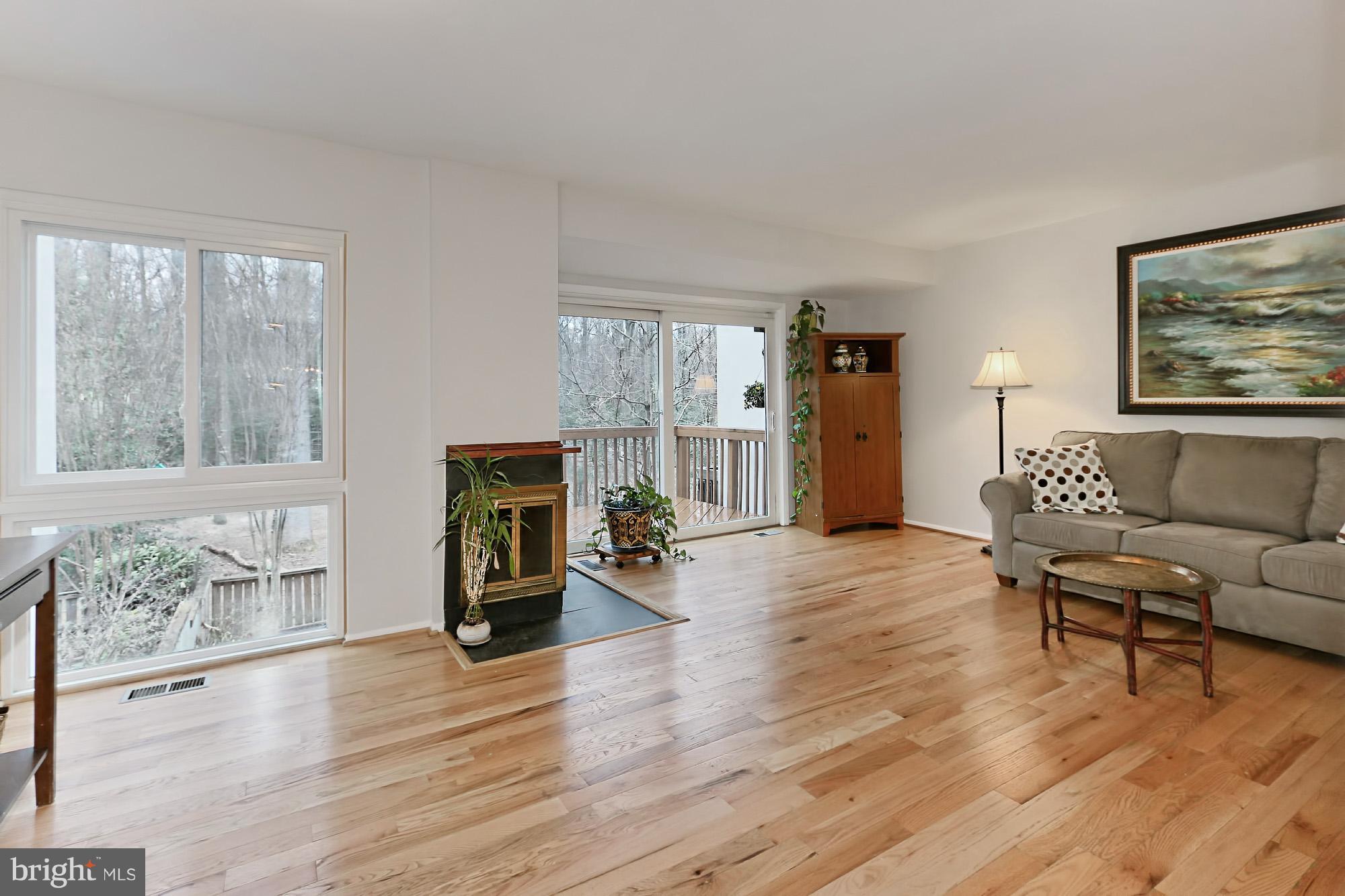 2380 Generation Drive Reston, VA 20191 - Photo 9 of 30 a living room with furniture and a wooden floor