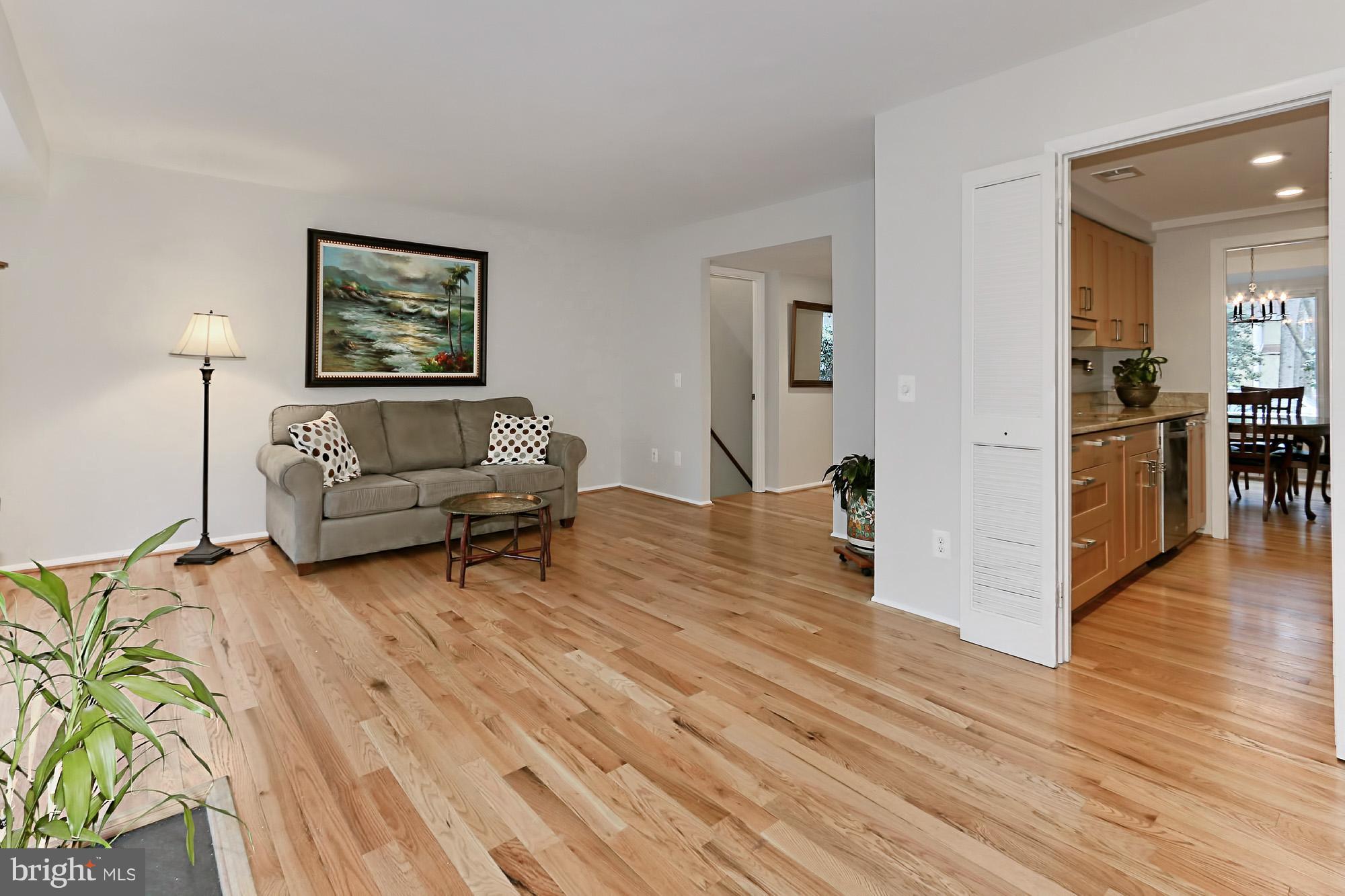 2380 Generation Drive Reston, VA 20191 - Photo 10 of 30 a living room with furniture and a wooden floor