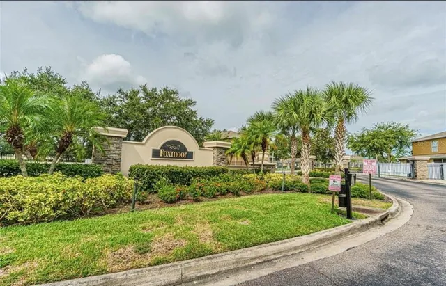 a view of a garden with a fountain