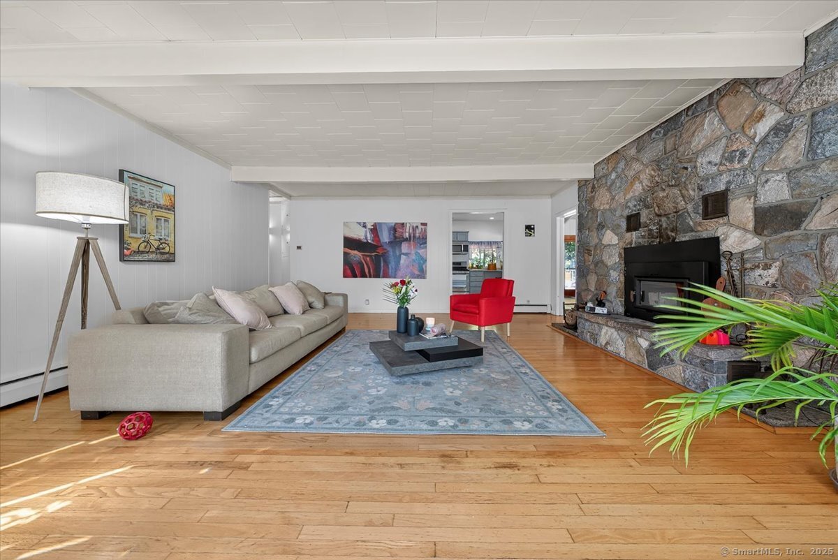 153 Short Woods Road New Fairfield, CT 06812 - Photo 22 of 38 a living room with furniture and a flat screen tv
