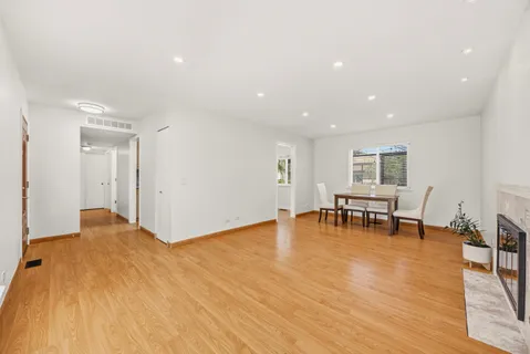 a view of dining room with furniture and a table