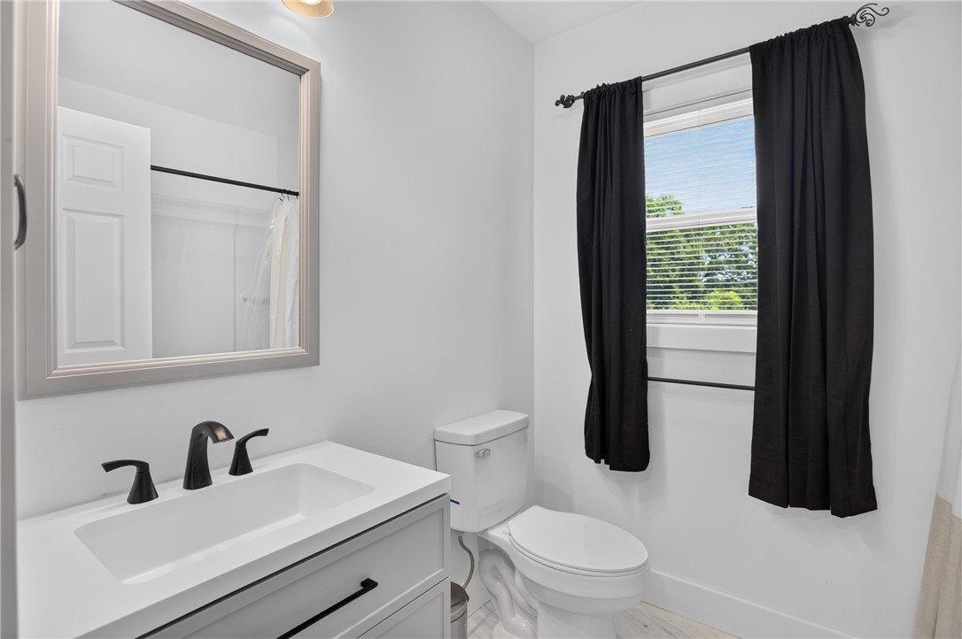 115 Pelfrey Street Seneca, SC 29672 - Photo 16 of 46 A well-appointed bathroom with contemporary fixtures and a bright window.