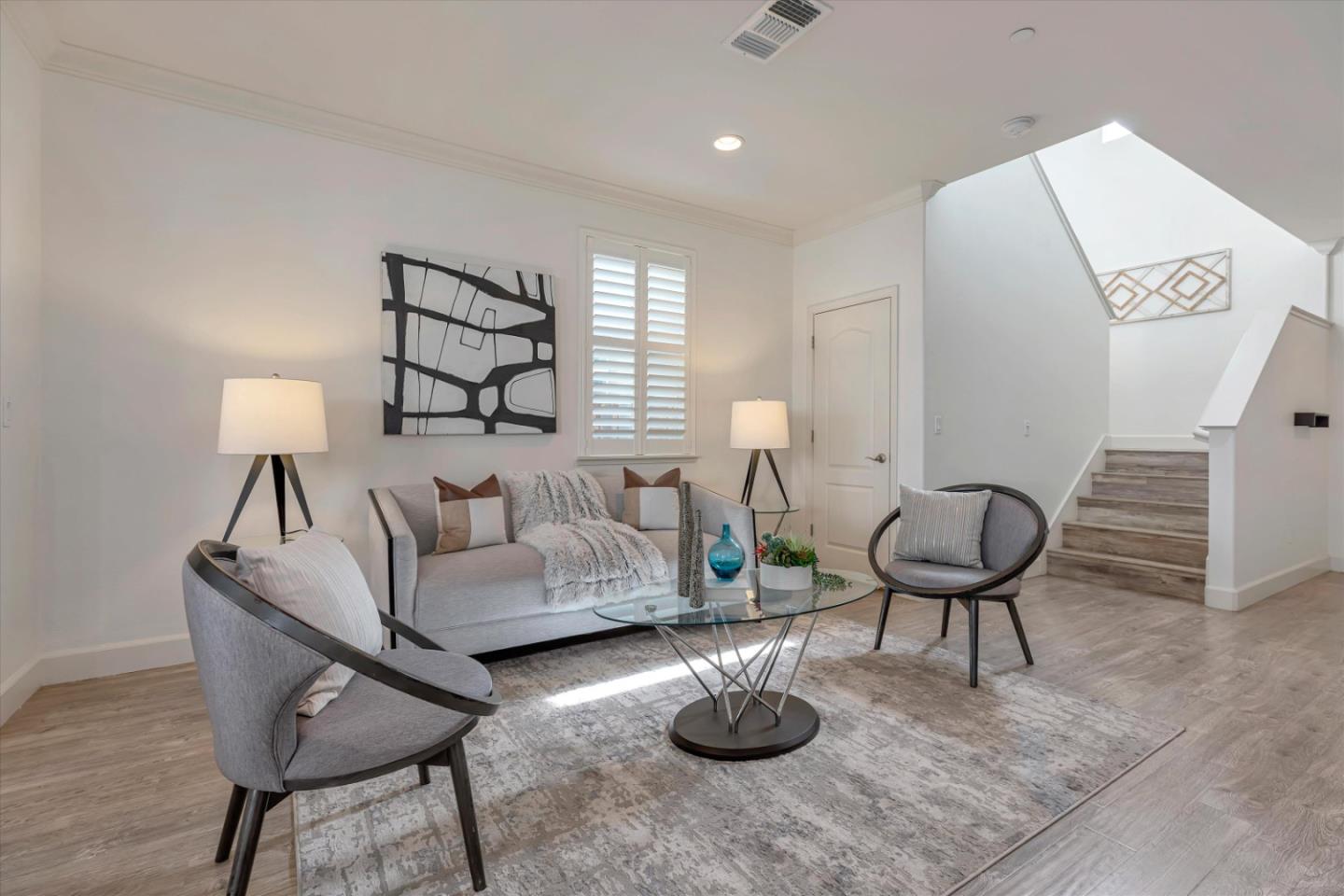 130 Palomino Place Gilroy, CA 95020 - Photo 13 of 50 a living room with furniture and a wooden floor