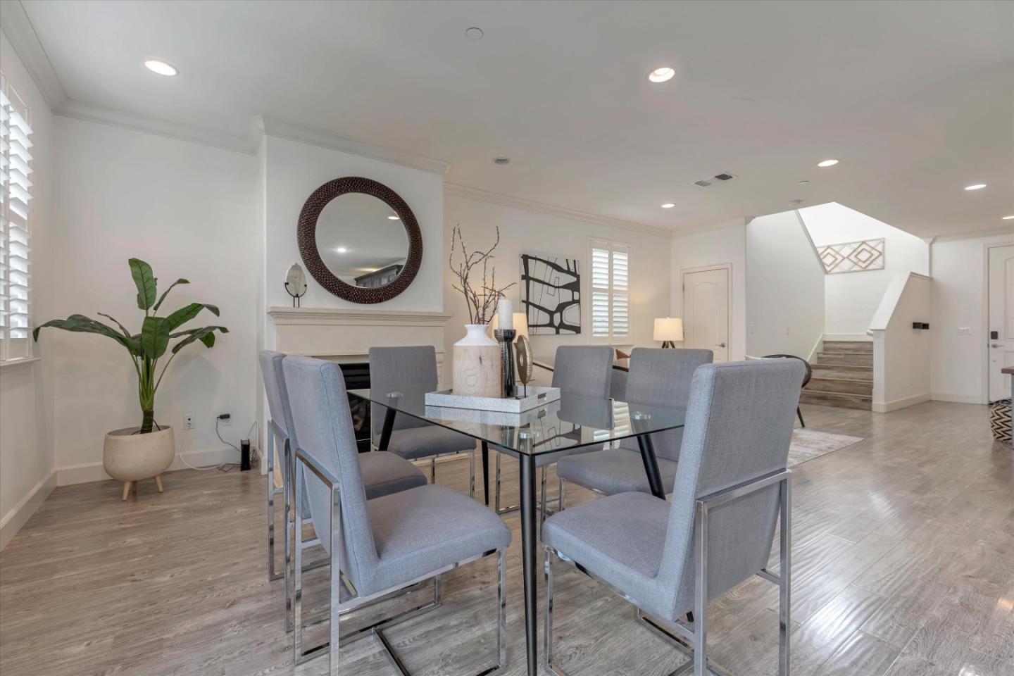 130 Palomino Place Gilroy, CA 95020 - Photo 17 of 50 a view of a dining room with furniture and a potted plant