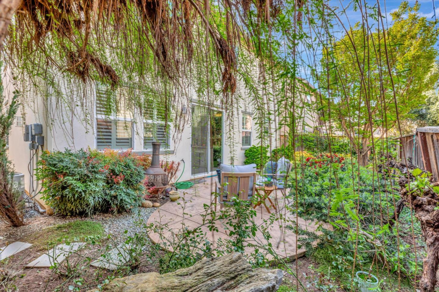 130 Palomino Place Gilroy, CA 95020 - Photo 37 of 50 a view of a chair and table in the garden