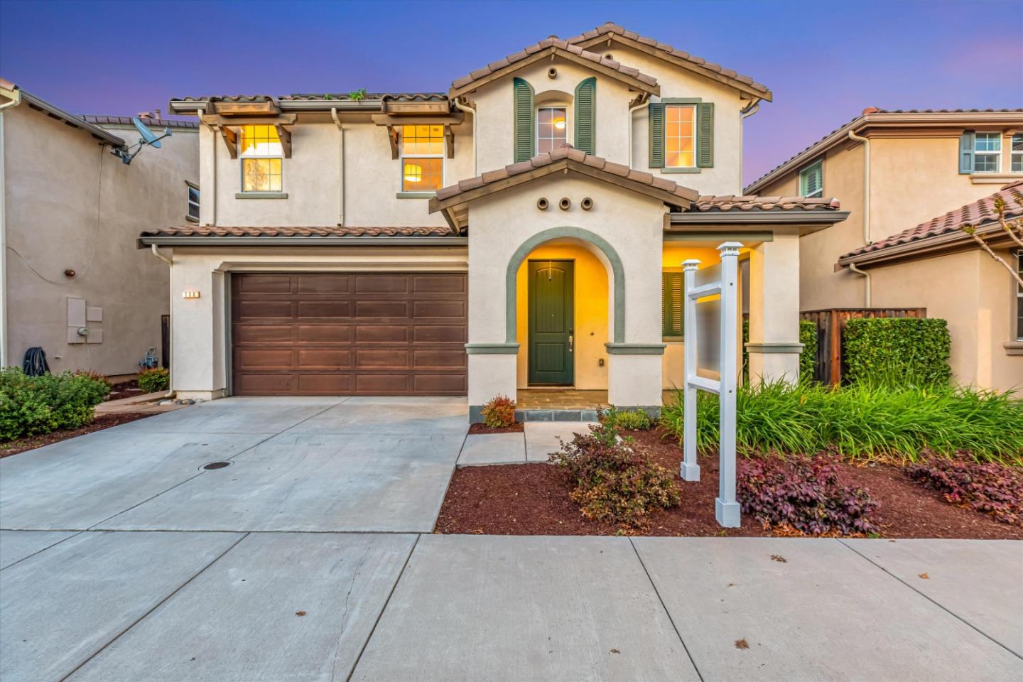 130 Palomino Place Gilroy, CA 95020 - Photo 42 of 50 a front view of a house with garden
