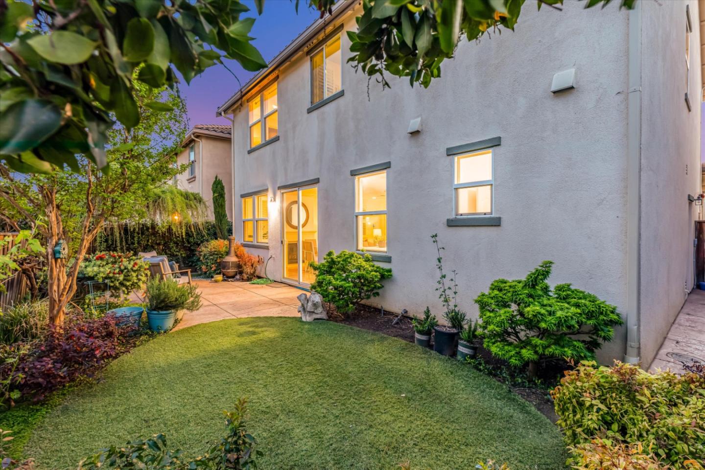 130 Palomino Place Gilroy, CA 95020 - Photo 47 of 50 a view of a house with a yard and potted plants