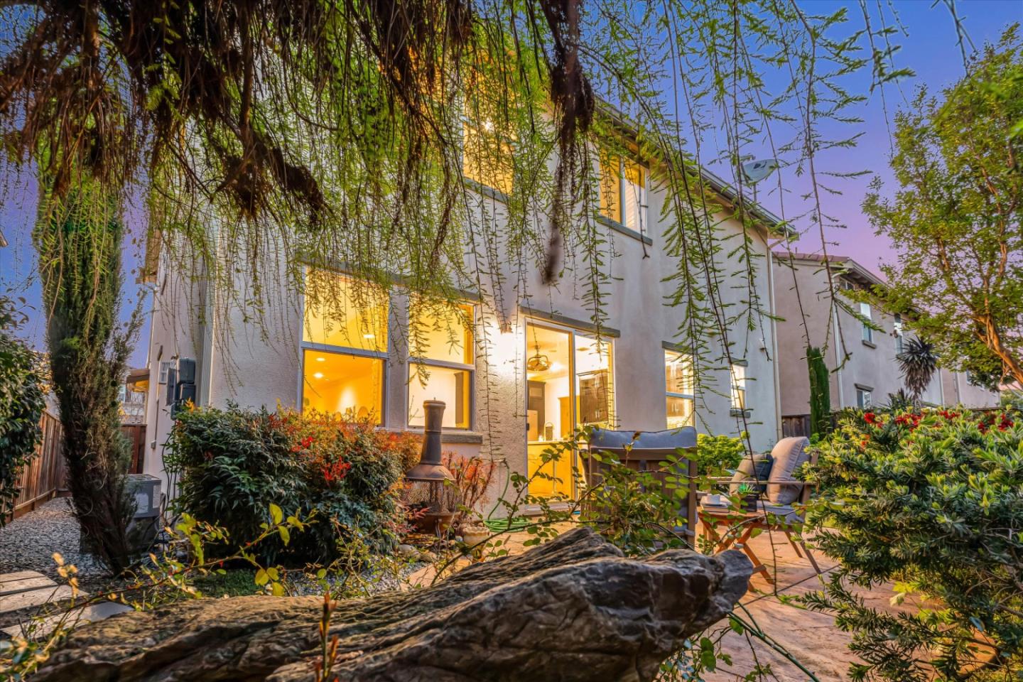 130 Palomino Place Gilroy, CA 95020 - Photo 48 of 50 a view of backyard of house with outdoor seating and green space