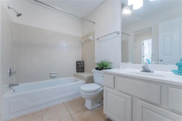 a bathroom with a sink a toilet and a bathtub