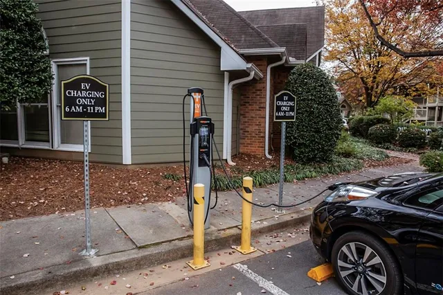 a view of a car parked in front of a house