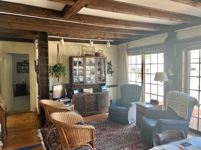 213 Main Street Chatham, MA 02633 - Photo 11 of 30 a living room with furniture and a window