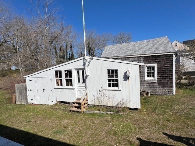 213 Main Street Chatham, MA 02633 - Photo 19 of 30 a view of a house with backyard