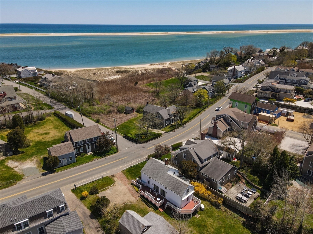 213 Main Street Chatham, MA 02633 - Photo 2 of 30 an aerial view of residential houses with outdoor space