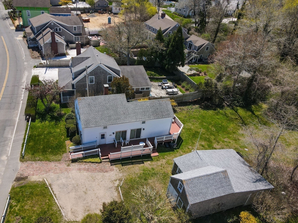 213 Main Street Chatham, MA 02633 - Photo 5 of 30 an aerial view of a house with swimming pool and outdoor seating