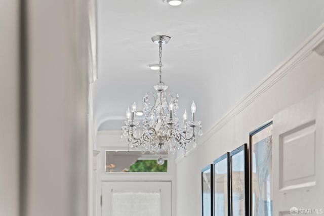 a view of a patio with a table and chairs