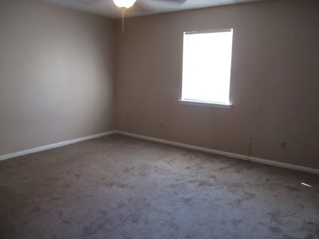 an empty room with a window