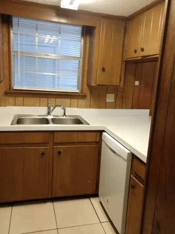 a kitchen with a sink and a cabinets