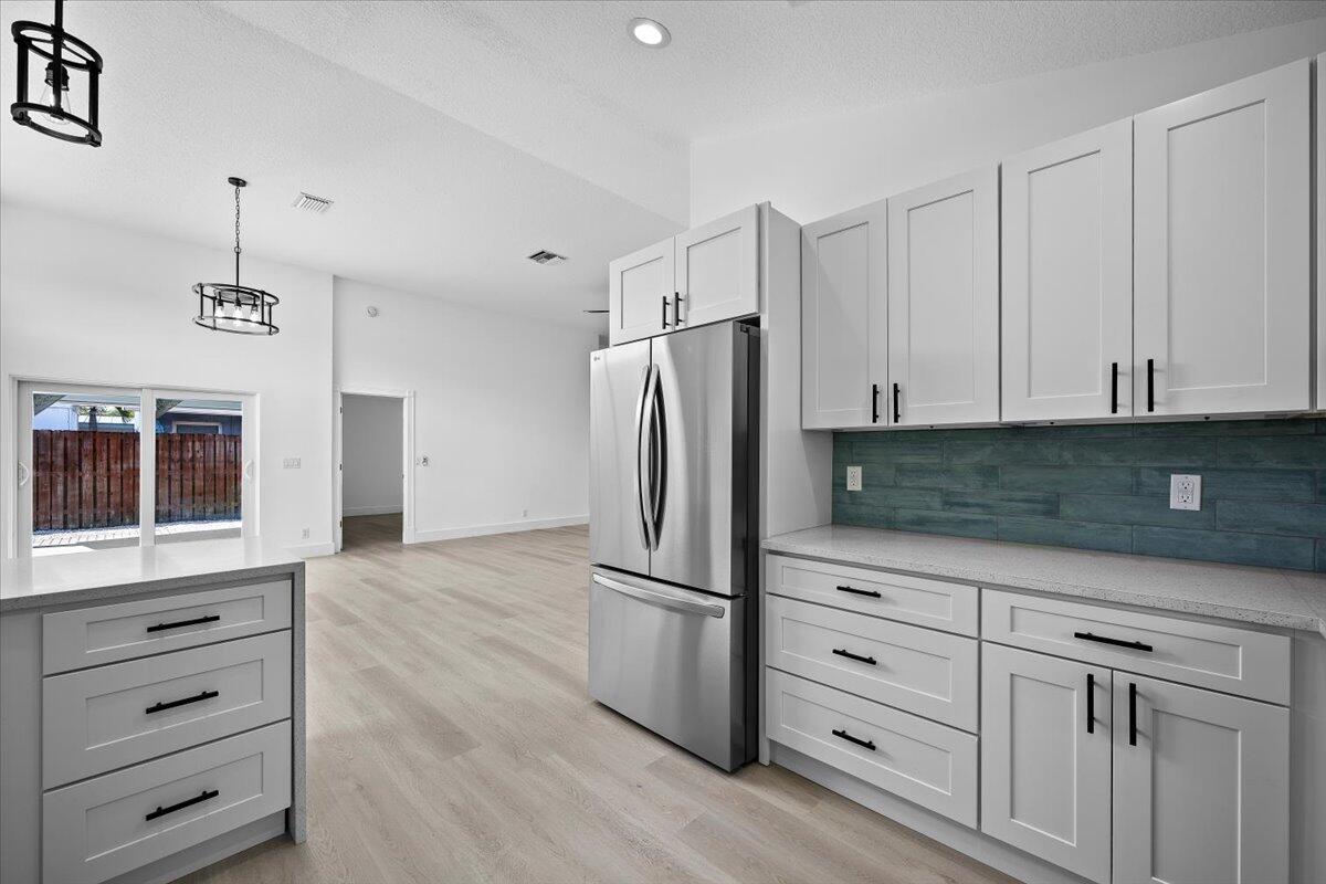 6334 Foster Street Jupiter, FL 33458 - Photo 4 of 24 11-LUX_6676