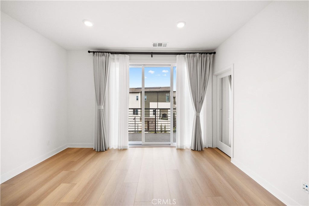 312 Tank Irvine, CA 92618 - Photo 41 of 75 wooden floor in an empty room with a window