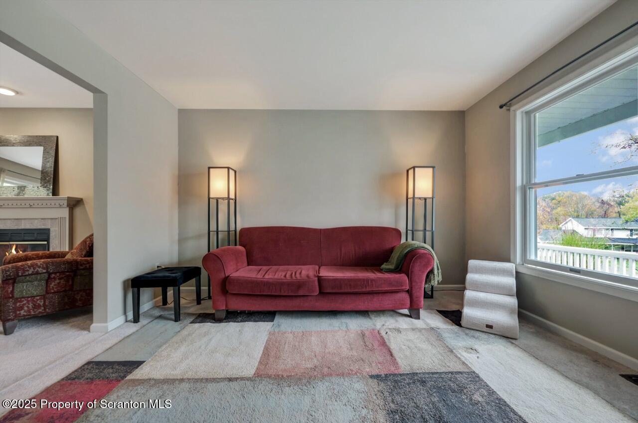 104 Beech Tree Circle Clarks Summit, PA 18411 - Photo 39 of 91 a living room with furniture and a window