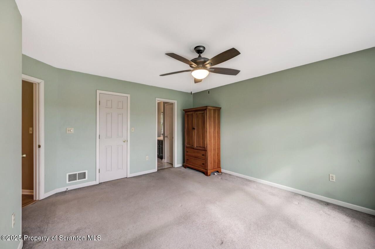 104 Beech Tree Circle Clarks Summit, PA 18411 - Photo 50 of 91 a view of an empty room with a window