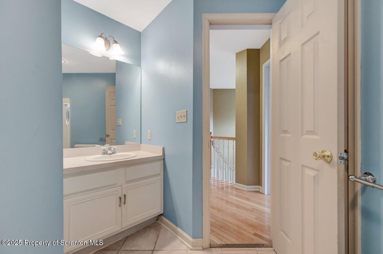 104 Beech Tree Circle Clarks Summit, PA 18411 - Photo 67 of 91 a bathroom with a double vanity sink and mirror