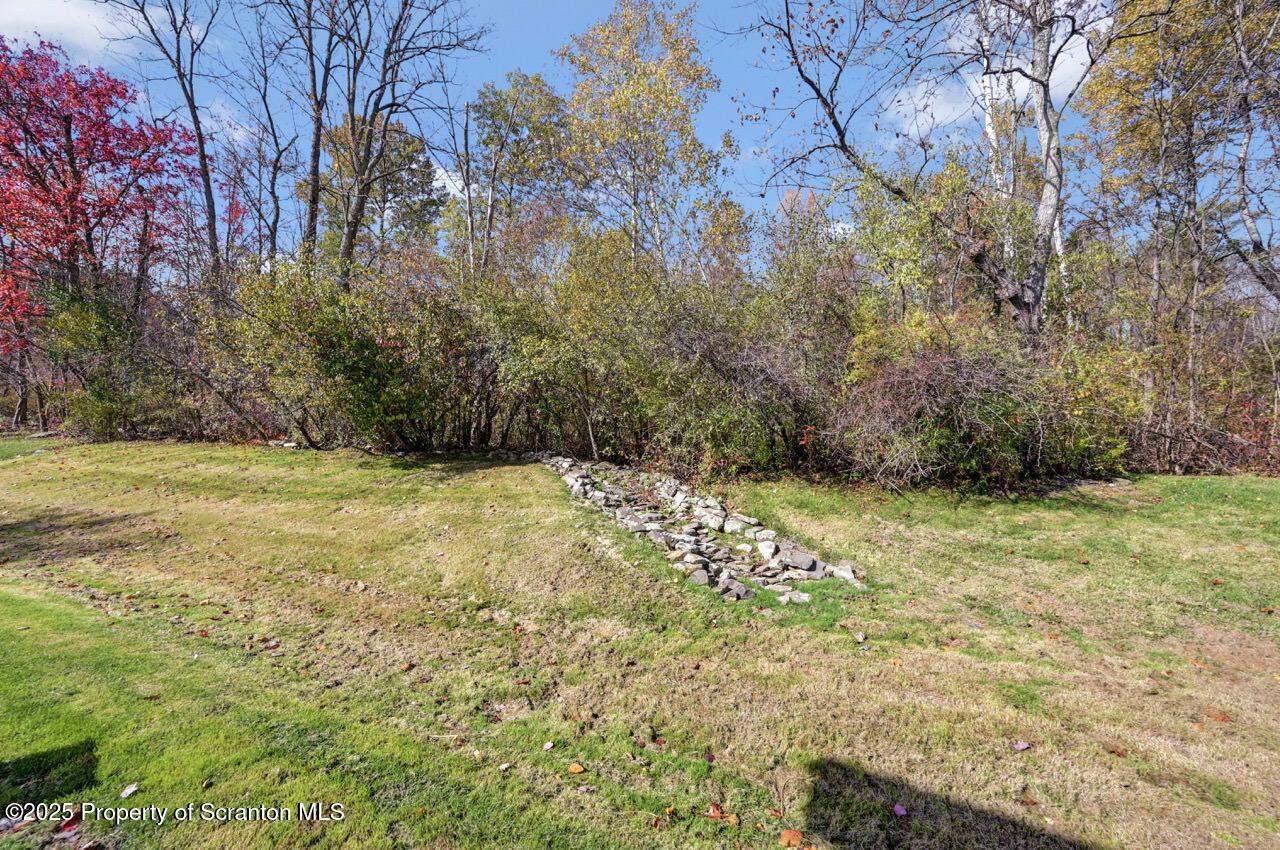104 Beech Tree Circle Clarks Summit, PA 18411 - Photo 87 of 91 a view of outdoor space with deck and yard