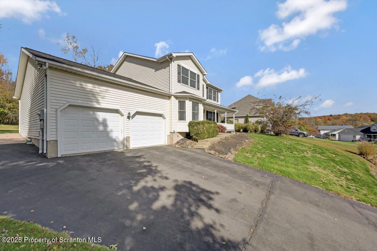 104 Beech Tree Circle Clarks Summit, PA 18411 - Photo 89 of 91 a view of a house with a yard