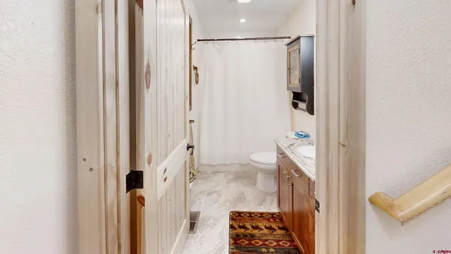 a bathroom with a sink and a shower