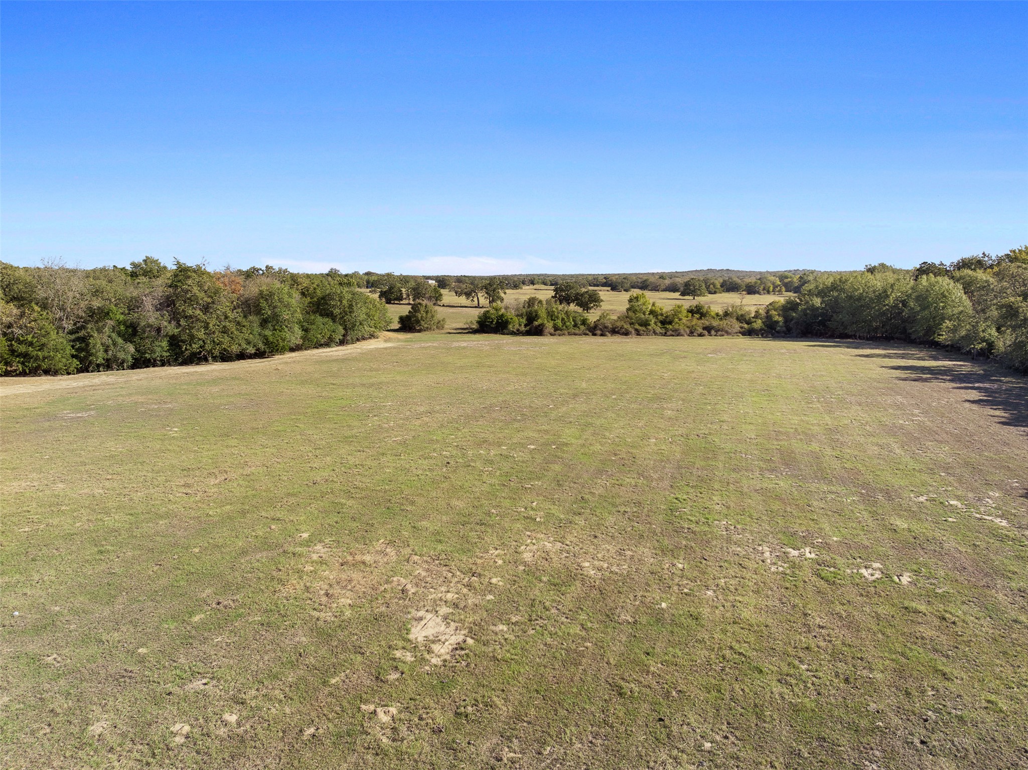 0 Stockade Ranch Road Paige, TX 78659 - Photo 18 of 37 View of grassy yard featuring a view of countryside