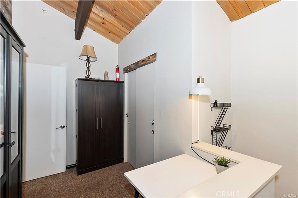 28393 Larchmont Lane Lake Arrowhead, CA 92352 - Photo 14 of 25 a bathroom with a sink and a mirror