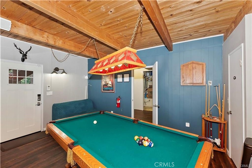 28393 Larchmont Lane Lake Arrowhead, CA 92352 - Photo 15 of 25 a room with pool table and windows