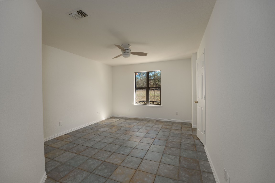 407 Raymond Road La Grange, TX 78945 - Photo 19 of 39 a view of an empty room with a window