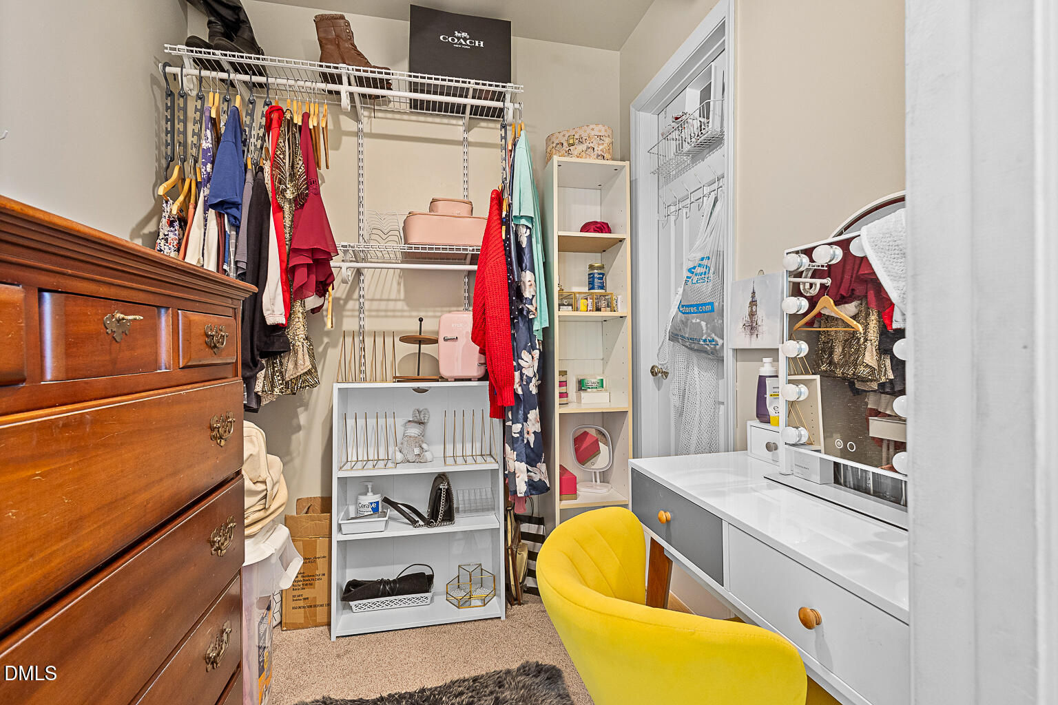 2907 Andover Glen Road Raleigh, NC 27604 - Photo 20 of 39 a view of walk in closet with clothes and shoes