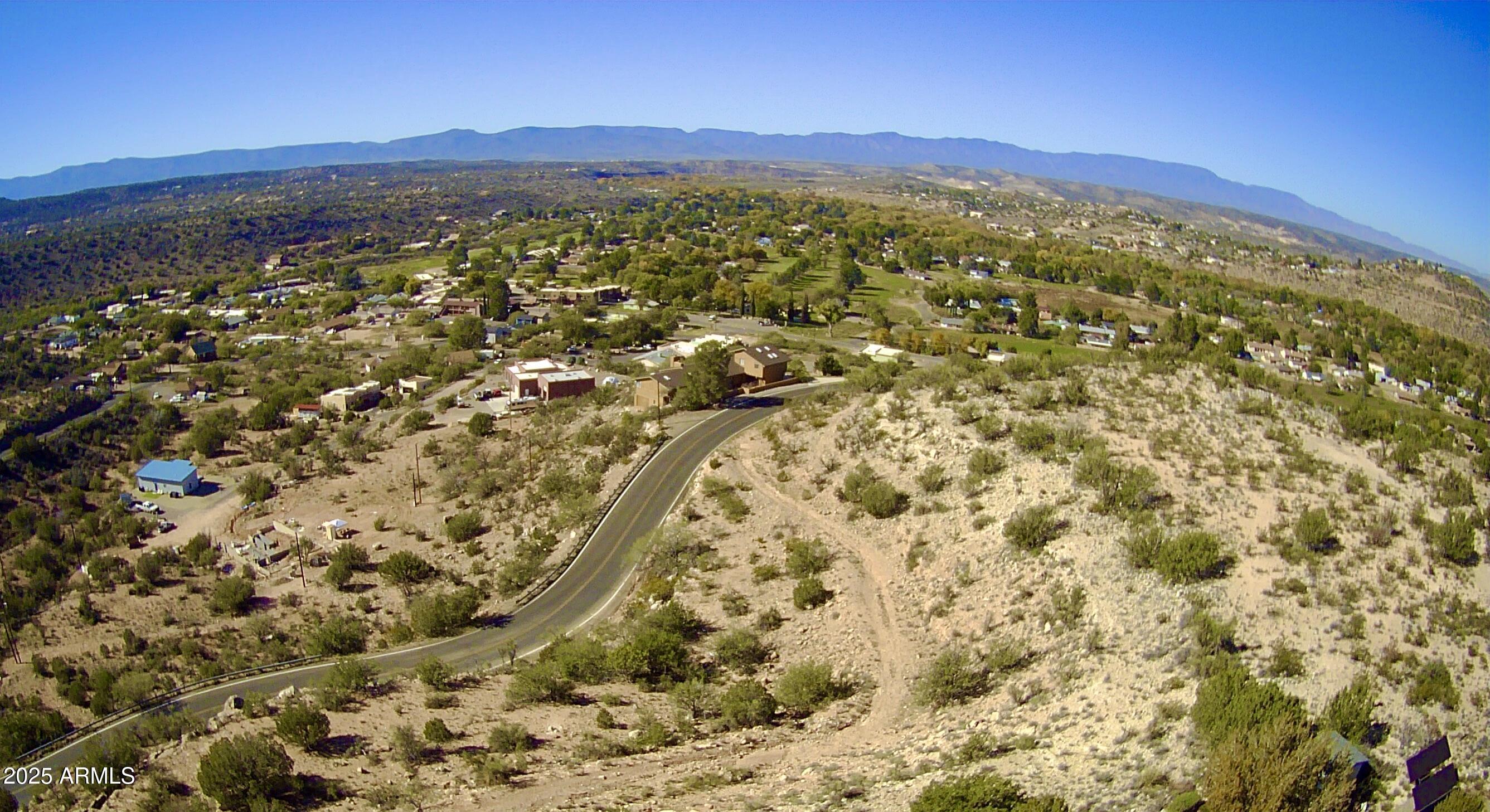 4430 East Geronimo Road, Unit 117 Rimrock, AZ 86335 - Photo 2 of 10 a view of a city with mountains in the background