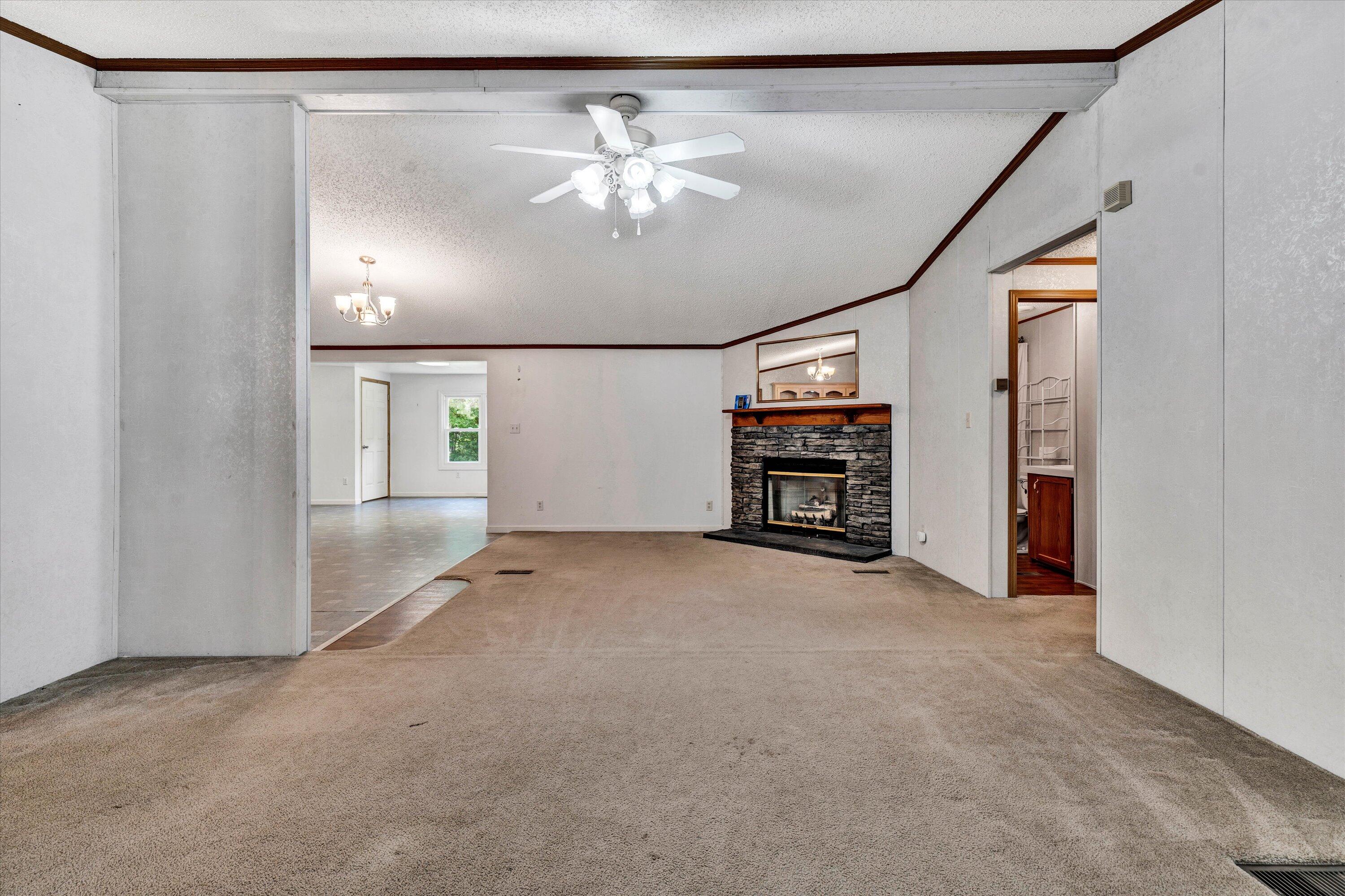 5232 Old Forge Road Rocky Mount, VA 24151 - Photo 11 of 41 a view of an empty room with a fireplace